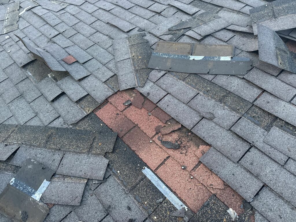 bad roof with shingles falling off